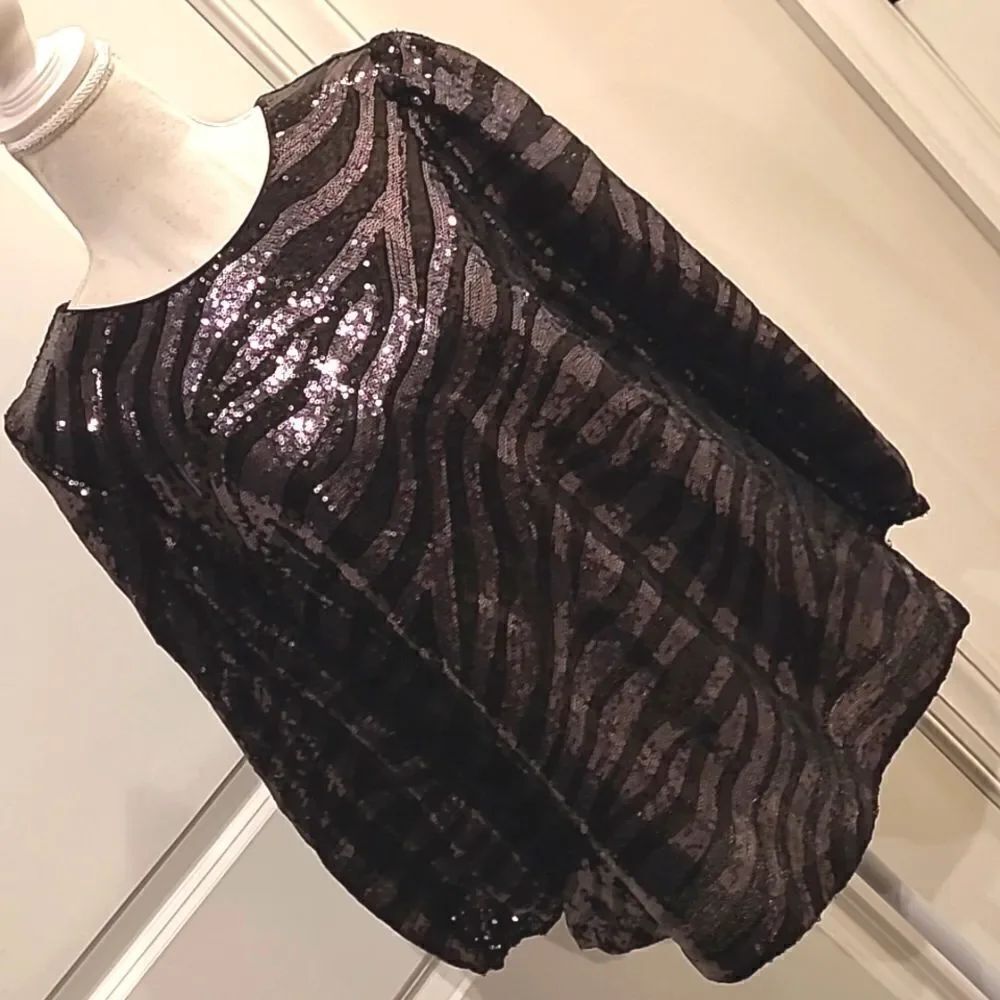 Black and gray tiger stripe sequined tunic top